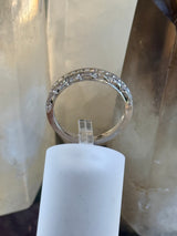 18kw .50ctw E, VS1 Diamond Crescent Tacorie band. Size 7